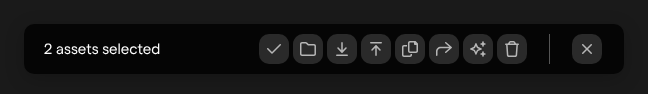 The selection toolbar with two assets selected and its row of action buttons.