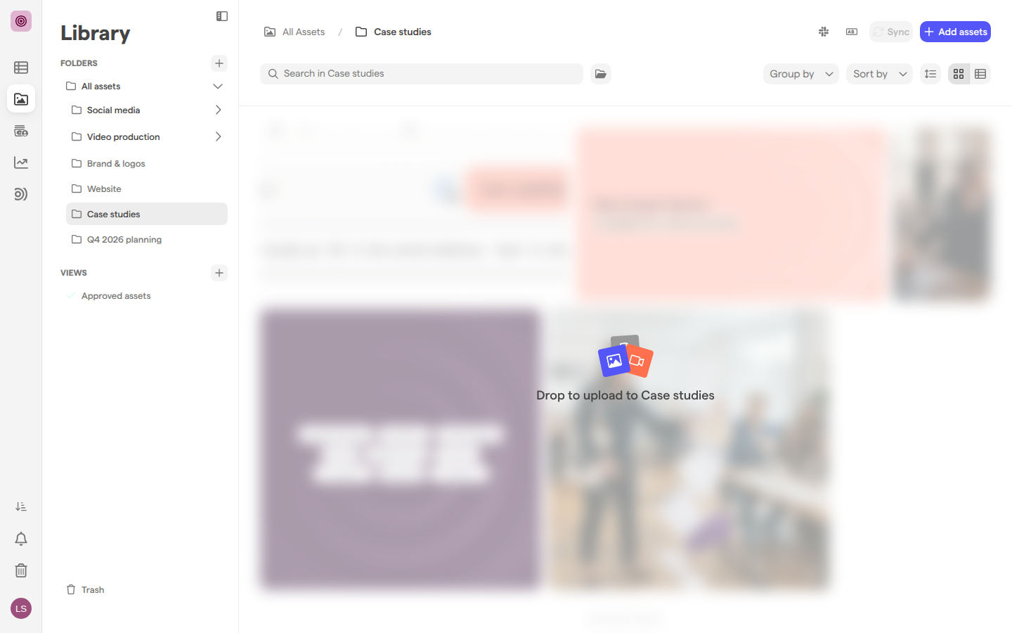 Files dragged over the Case studies folder, with the message Drop to upload to Case studies across the library.