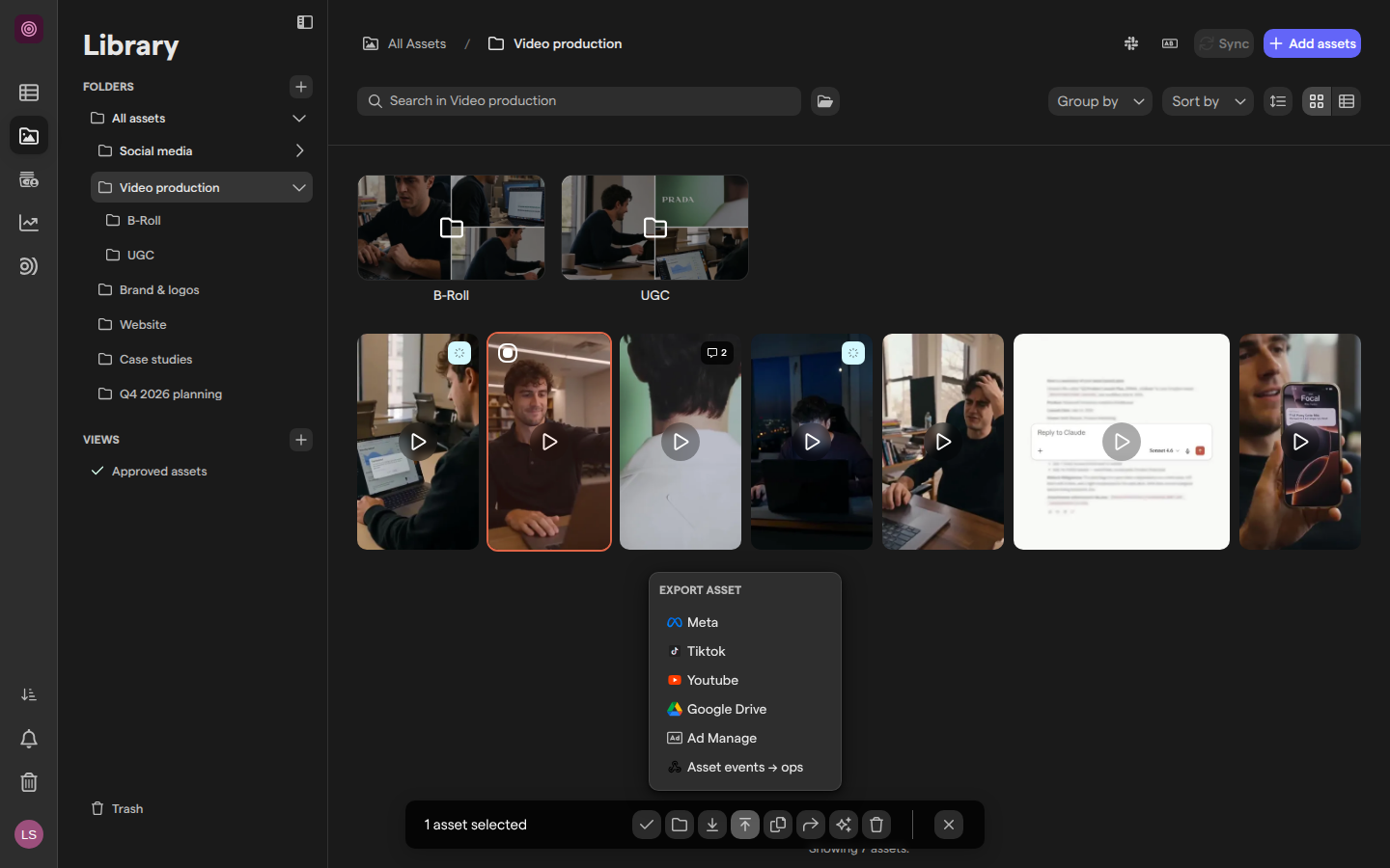 A library folder with one video selected and the Export asset menu open, listing Meta, Tiktok, Youtube, Google Drive, Ad Manage and a webhook, with the Slack icon and the Sync button in the folder header.