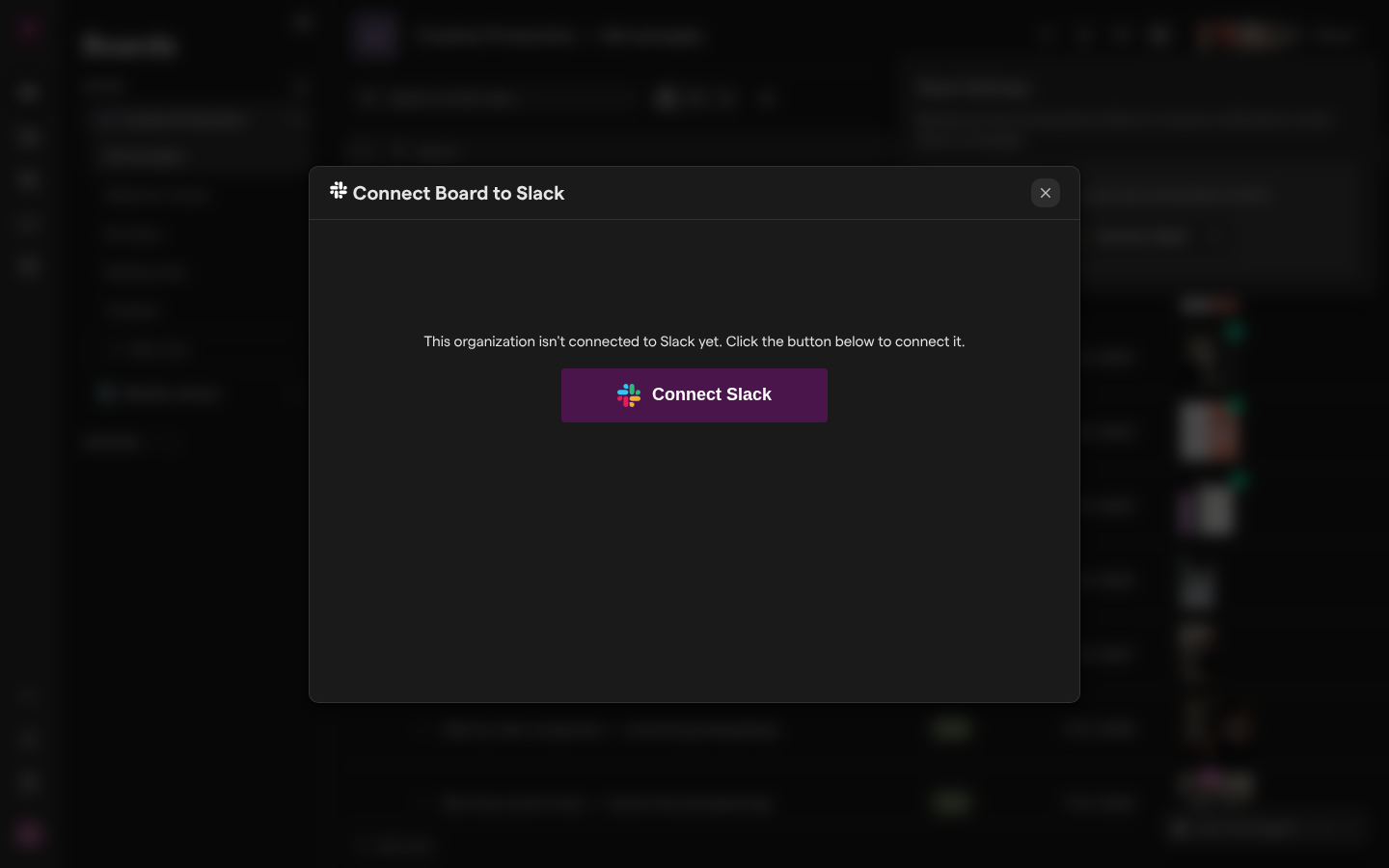 The Connect Board to Slack dialog over a board, saying the organization isn’t connected to Slack yet, with a Connect Slack button.