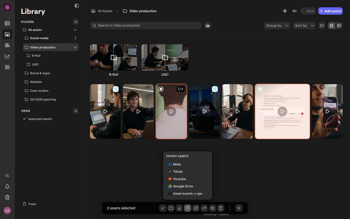 The Video production folder with two videos selected and the Export assets menu open, listing Meta, Tiktok, Youtube, Google Drive and a webhook.