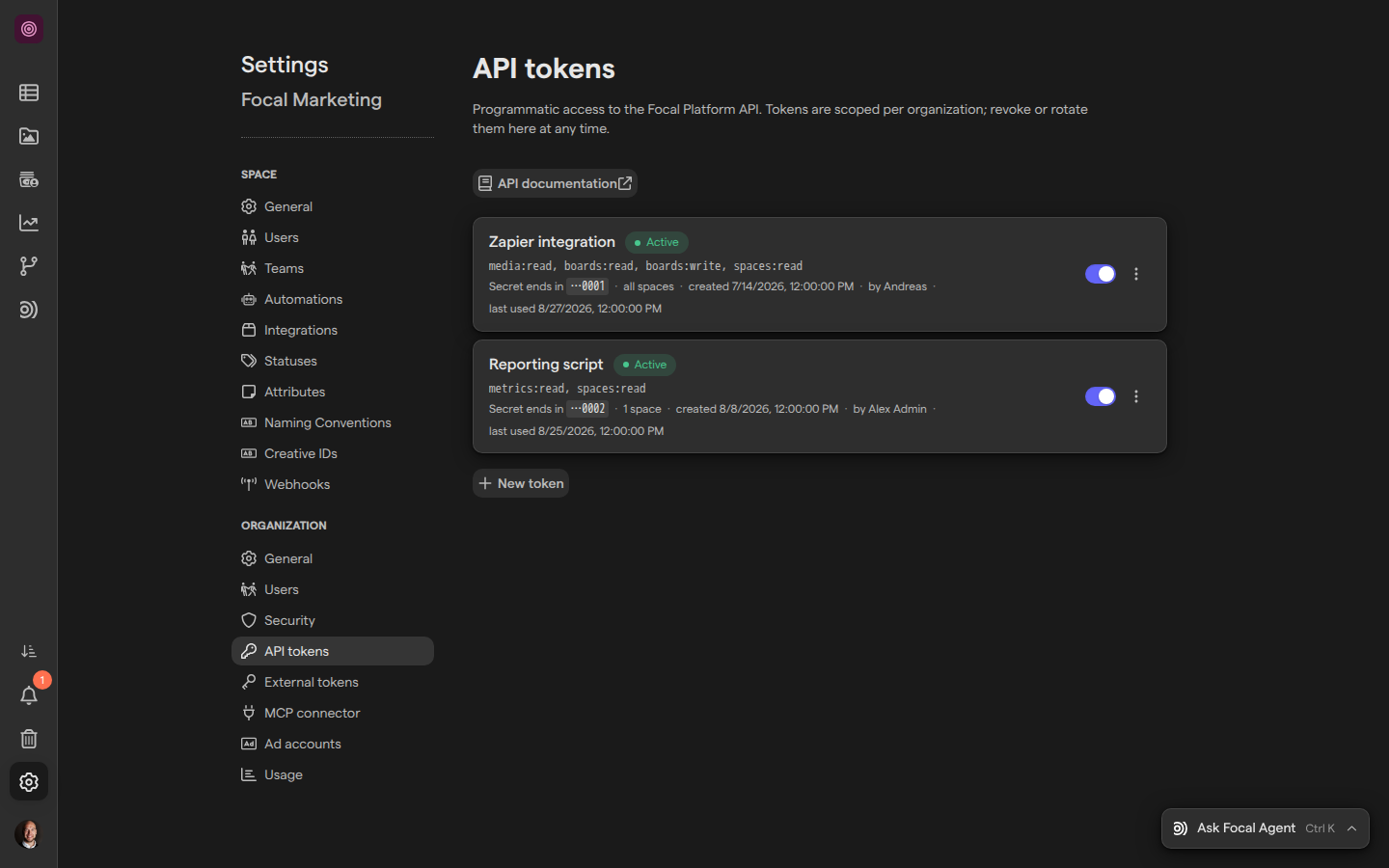 The API tokens page of organization settings, listing two tokens with their status, scopes, space access and dates.