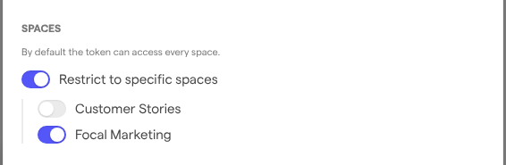 The Spaces section of the token dialog with Restrict to specific spaces on and only Focal Marketing switched on.