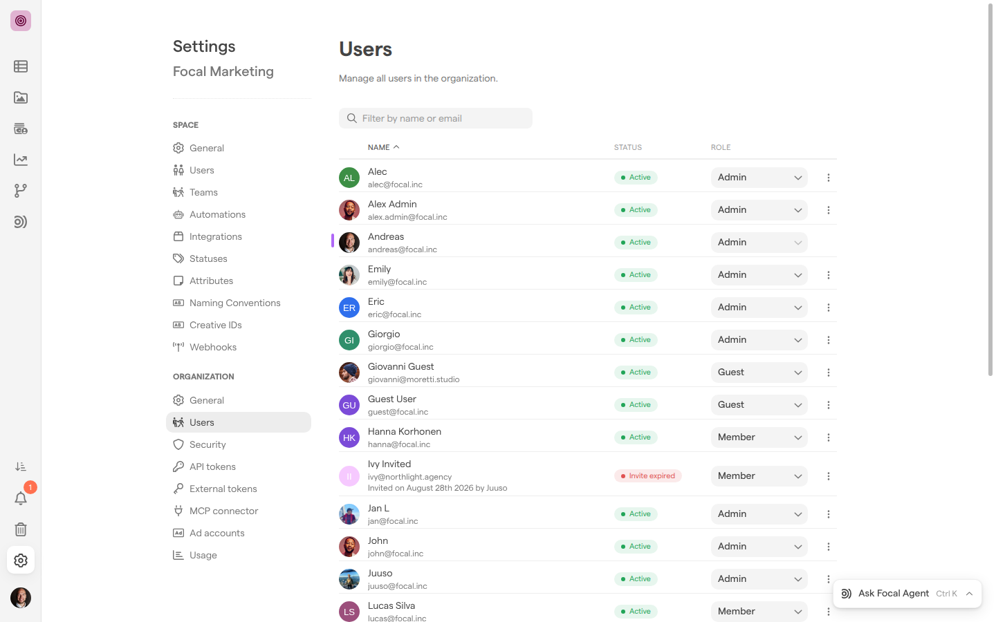 The Users page of organization settings, listing people with their email address, an Active or Invite expired status and an organization role.