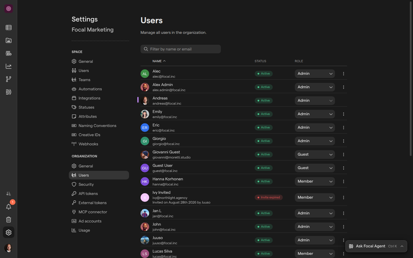 The Users page of organization settings, listing people with their email address, an Active or Invite expired status and an organization role.