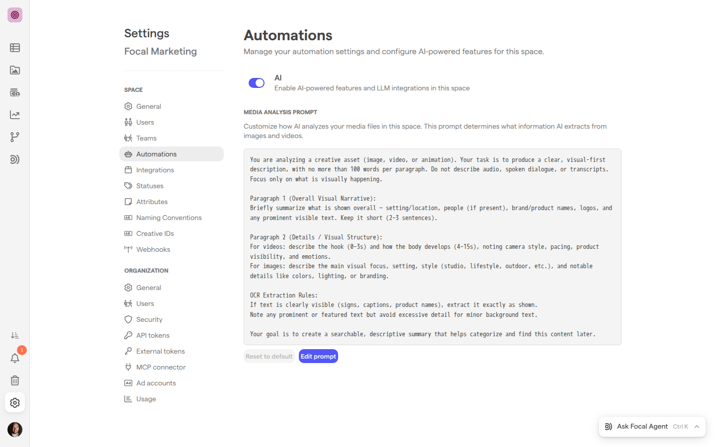 The Automations page of Space Settings for the Focal Marketing space, with the AI switch on and the Media Analysis Prompt showing the default prompt above the Reset to default and Edit prompt buttons.