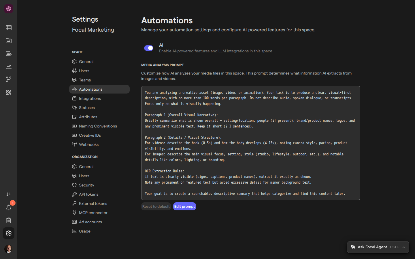 The Automations page of Space Settings for the Focal Marketing space, with the AI switch on and the Media Analysis Prompt showing the default prompt above the Reset to default and Edit prompt buttons.